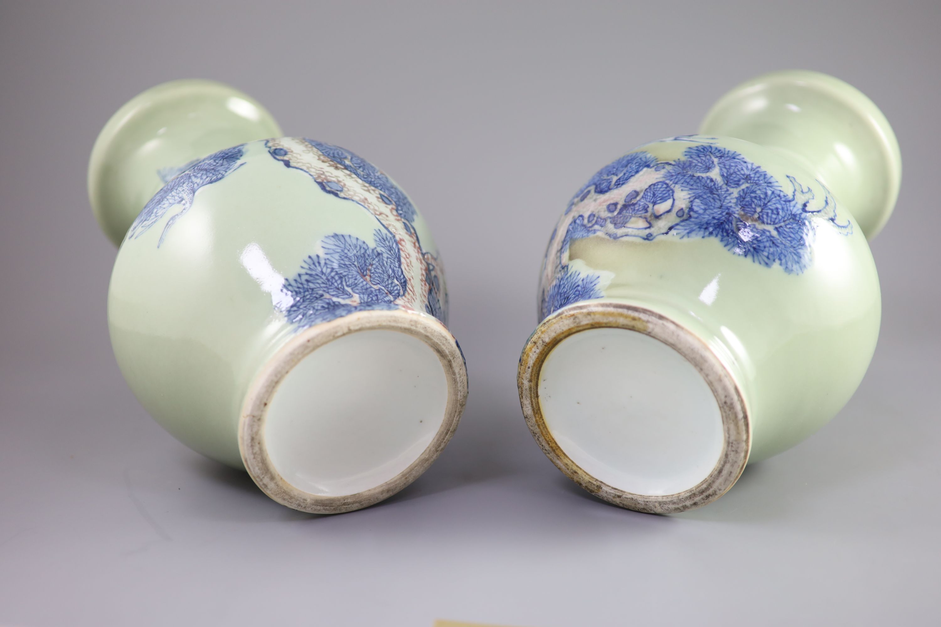 A pair of Chinese underglaze blue and copper red celadon ground vases, probably Republic period 31.5 and 32 cm high